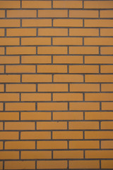 Żółty mur z cegły