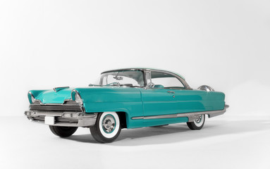 old green, classic vintage car on white isolated background