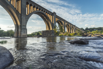 This concrete arch railroad bridge spanning the James River was built by the Atlantic Coast Line, Fredericksburg and Potomac Railroad in 1919 to route transportation of freight around Richmond, VA.