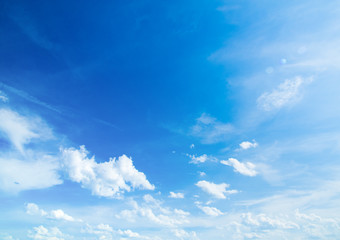 The blue sky with clouds, background