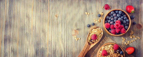 Fresh healthy breakfast with granola and berries, copy space rus