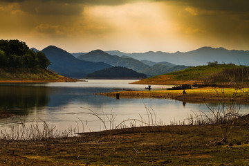 light rays on river mountain