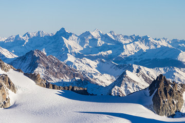 Ski resort Chamonix Mont Blanc. The mountain is the highest in the alps and the European Union. Alpine mountains range landscape in beauty French, Italian and Swiss ALPS seen from Aiguille du Midi