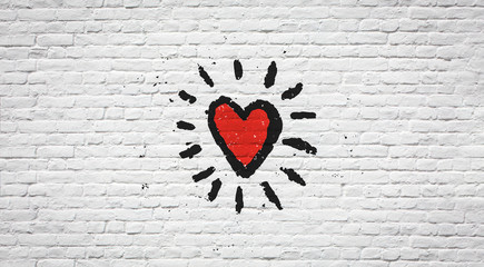 Serce na ścianie z cegły
