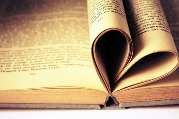 Nostalgic vintage retro sepia rural style heart shape from book pages