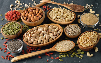 Different super foods on a gray background