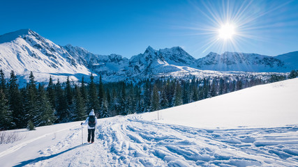 Tourist going to Hala Gasienicowa, Tatra mountans, Poland