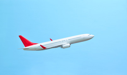 white airplane on a blue 