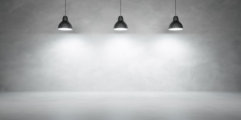 Betonowa ściana z 3 lampami