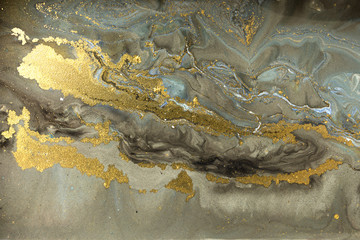 Złoty marmurkowy wzór tekstury. Niebieski i złoty wzór marmuru. Płynna sztuka.