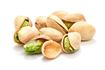 heap of ripe pistachio isolated on whtie background