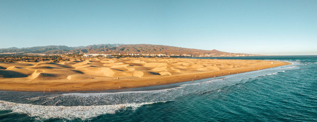 Aerial Maspalomas dunes view on Gran Canaria island near famous RIU hotel.