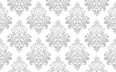 Kwiatowy wzór. Tapeta w stylu barokowym. Bezszwowe tło wektor. Biało-szary ornament do tkanin, tapet, opakowań. Ozdobny ornament kwiat adamaszku.