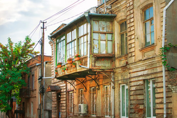 Classic Georgian style Old wooden balcony on the street of Tbilisi old town