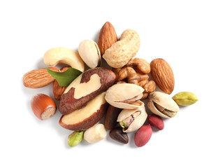 Pile of mixed organic nuts on white background