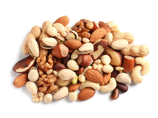 Pile of mixed organic nuts on white background