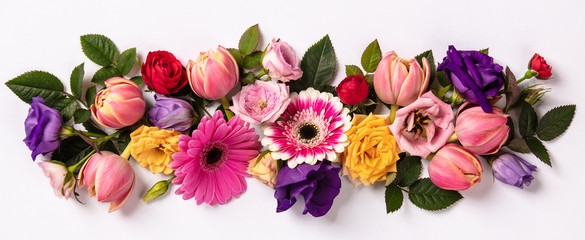 Creative layout made with beautiful flowers on white background.