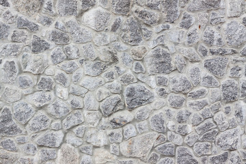 Tło rozdrobnione kamienny mur