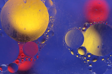 Masła bańki tekstury na tle koloru