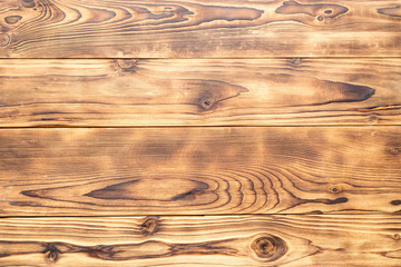 The brown horizontal wooden background