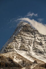 Mount Robson Peak with snow and cloud