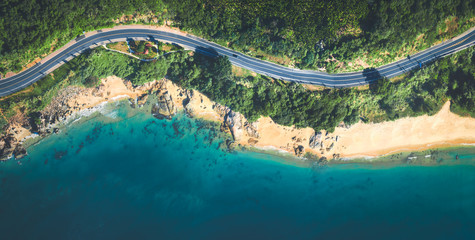 Aerial view of the sandy beach and road