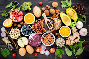 Ingredients for the healthy foods selection. The concept of healthy food set up on wooden background.