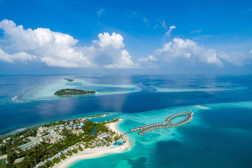 Aerial view of beautiful island at Maldives in the Indian Ocean. Top view from drone.