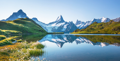 Sunrise view on Bernese range above Bachalpsee lake. Peaks Eiger, Jungfrau,Faulhorn in famous location. Switzerland alps, Grindelwald valley