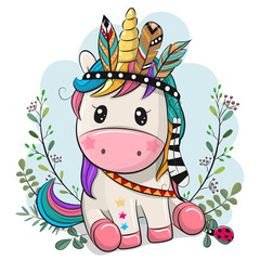 Jednorożec kreskówka z piór na niebieskim tle