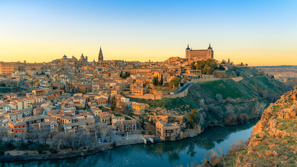 Breathtaking panoramic view of beautiful sunset over the old town of Toledo. Travel destination Spain