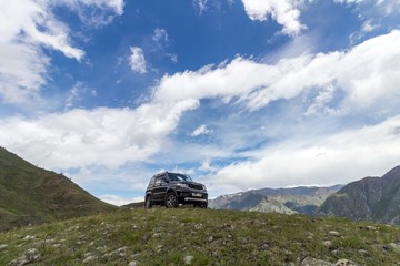 the car climbed into the mountains where no man’s foot has stepped