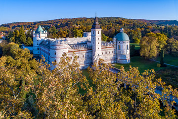Renaissance castle and park in Krasiczyn near Przemysl , Poland. Aerial view in fall in sunset light