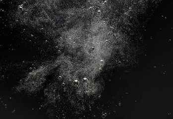 Air bubbles in the water pattern or texture on black background