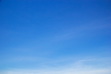 Blue sky background and white clouds soft focus, and copy space
