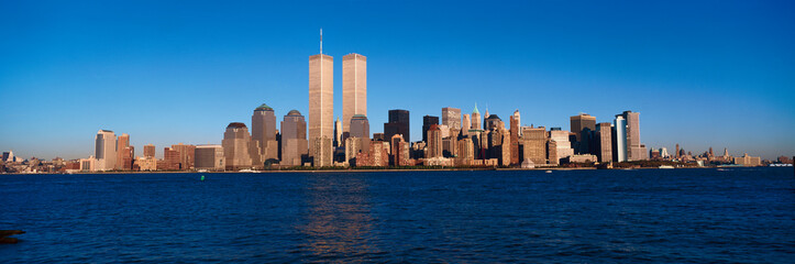 Panoramic view of lower Manhattan and Hudson River, New York City skyline, NY with World Trade Towers at sunset