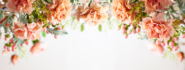 Autumn composition made of beautiful flowers on light backdrop. Floristic decoration. Natural floral background.