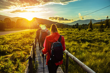 Hiking in the mountains. Walking on a meadow in Bieszczady Poland.