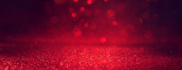 tło abstrakcyjnych świateł brokat czerwony, złoty i czarny. 