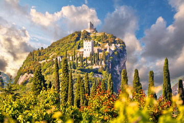 Arco castle ruins on cliffs above Garda lake