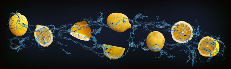 Panorama z owocami w wodzie - soczyste cytryny są pełne witamin i minerałów