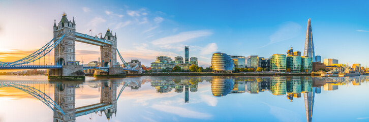 Morning panorama of London Tower Bridge with reflection 