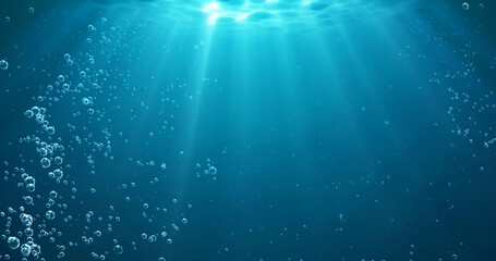 Underwater background with water bubbles and undersea light rays shine