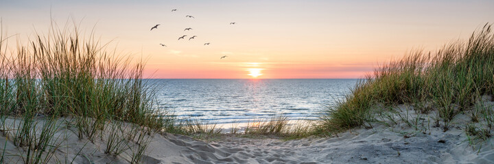 Dune beach panorama at sunset