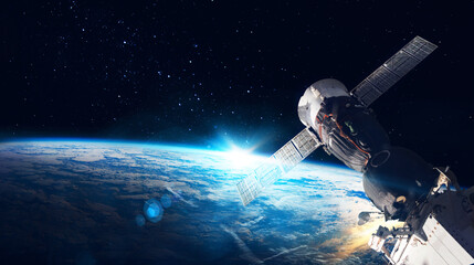 Space station on orbit of the Earth planet and universe background. Elements of this image furnished by NASA