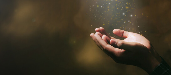 Human hands open palm up worship with faith in religion and belief in God on blessing background.Christian Religion concept background.