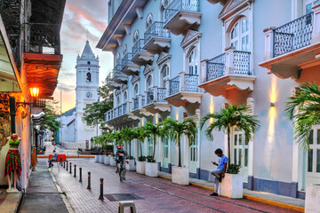 Avenida Central in Casco Viejo, Panama with Santa Maria La Antigua - Metropolitan Cathedral - in the background at sunset
