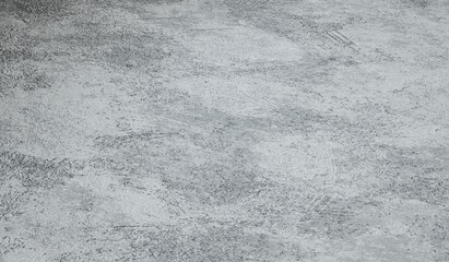 Szare nierównomierne tło.
