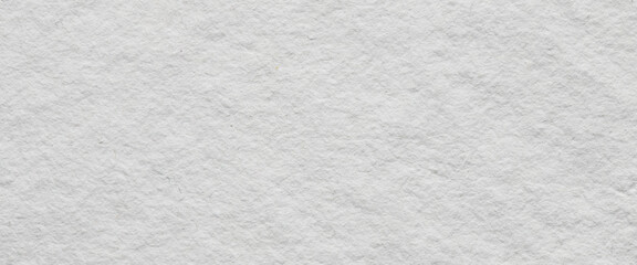 Jasny papier, faktura białego papieru jako tło lub tekstura.