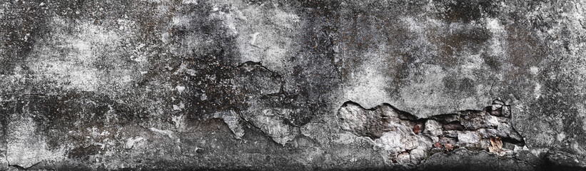Tekstura postarzanej naturalnej ulicznej ściany. Tło skorodowanej tekstury pęknięć. Tapeta. Panorama. BW